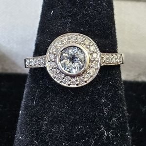 New. 14k white gold aquamarine & diamond ring size 7 1/4. Amazing color to the a